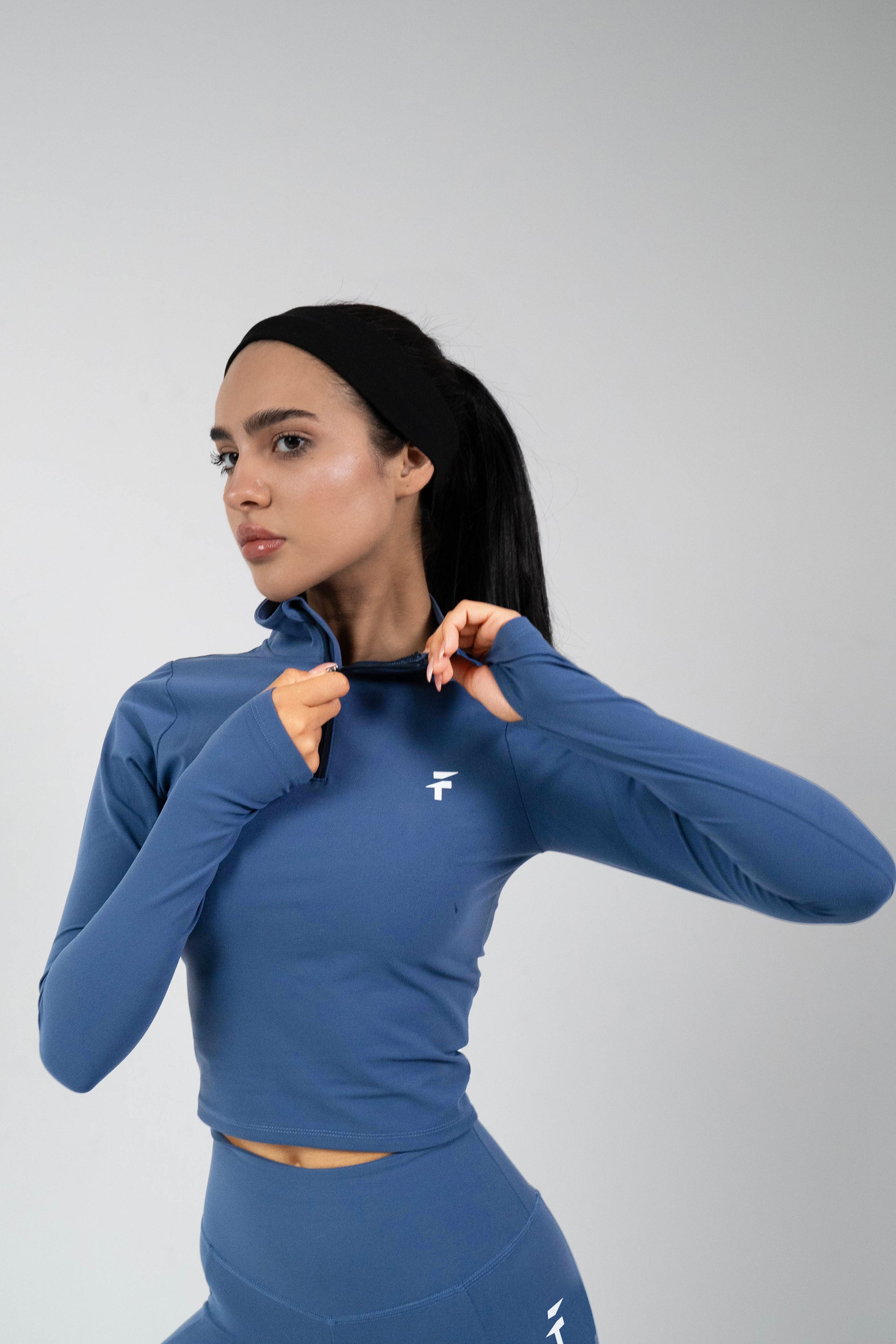 ULTRA SOFT ESSENTIAL ZIP-UP BODY FIT TOP - Crystal Blue