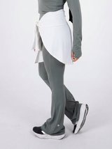 Performance Hip Cover White - Long version, side view showing extended hem